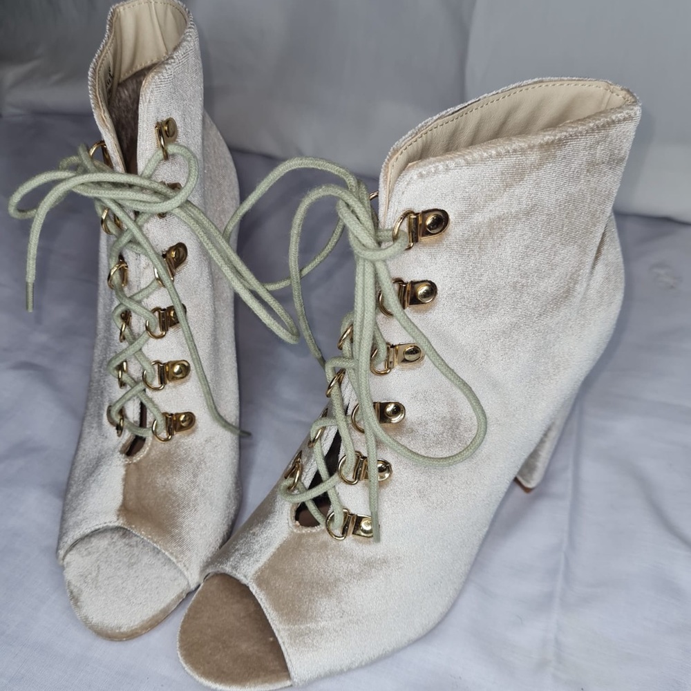 Velvet laced brown booties.
